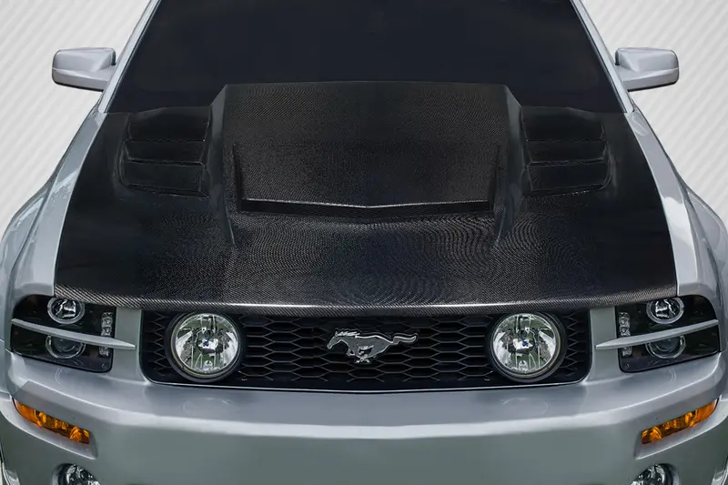 Carbon Creations 05-09 Ford Mustang Carbon Fiber Interceptor Hood 1