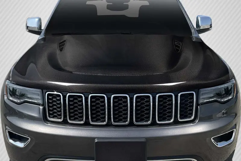 Carbon Creations 11-22 Jeep Grand Cherokee Carbon Fiber Delta Hood 1