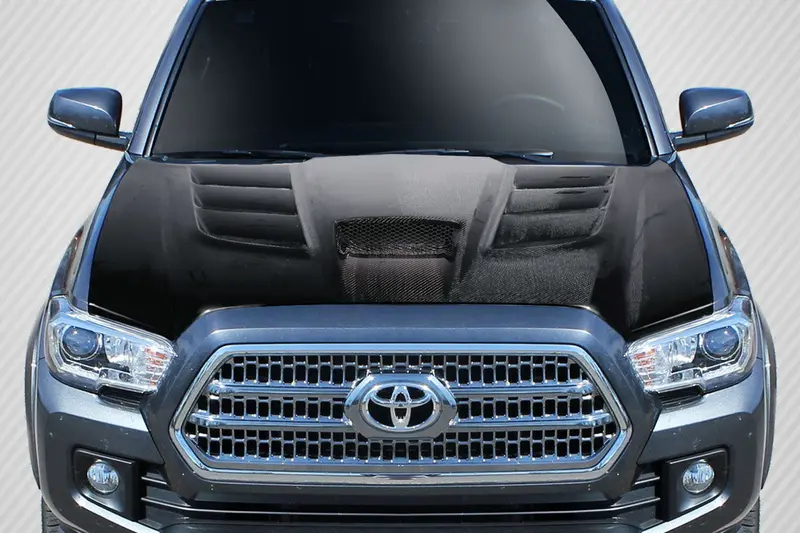 Carbon Creations 12-15 Toyota Tacoma Carbon Fiber Viper Type Hood 1