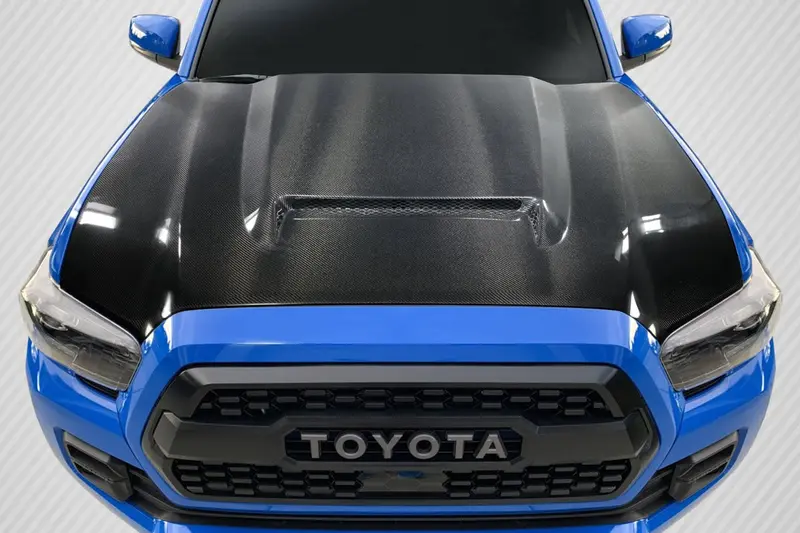 Carbon Creations 16-23 Toyota Tacoma Carbon Fiber Rks Hood 1
